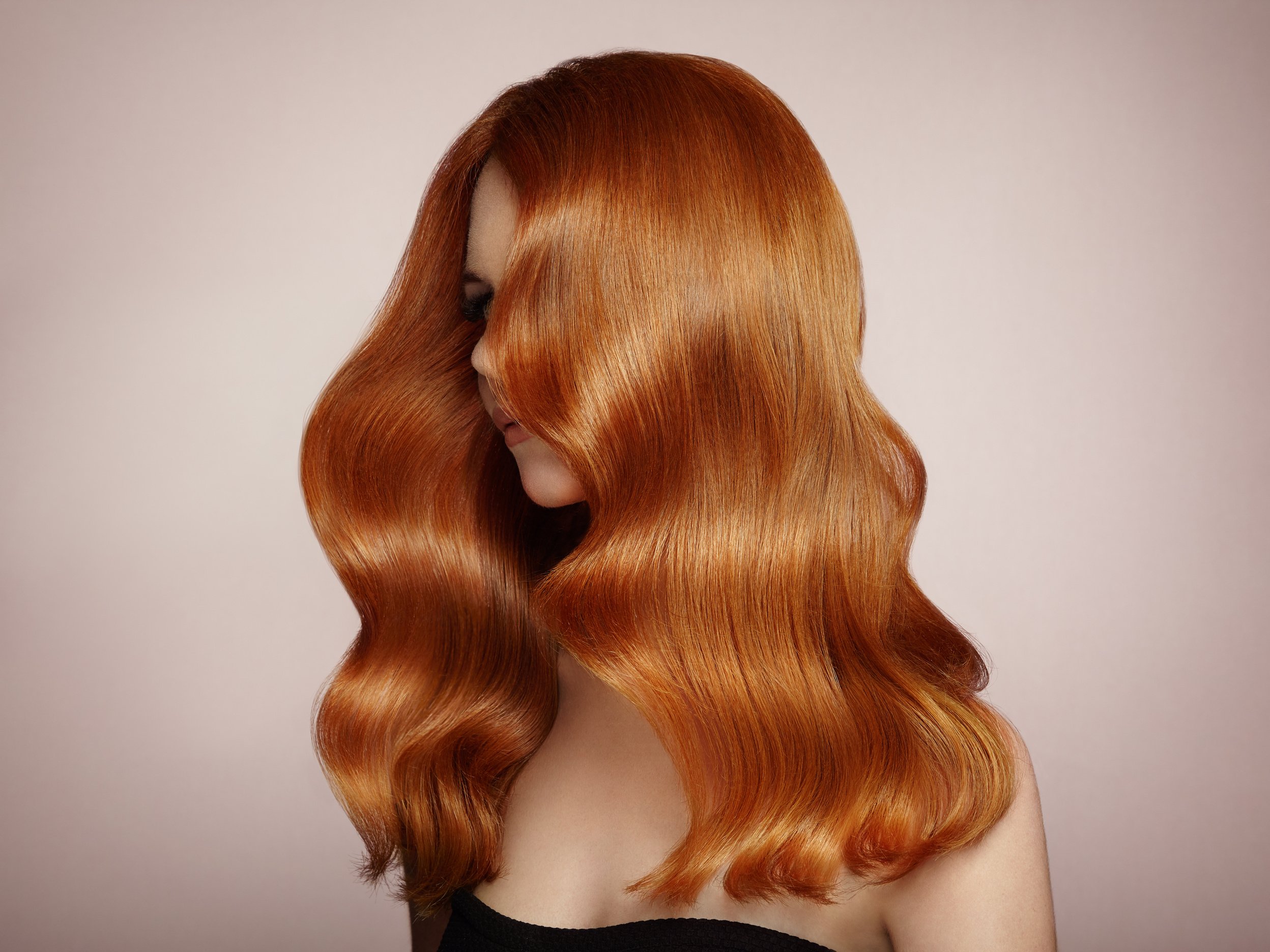 Redhead woman with curly hair